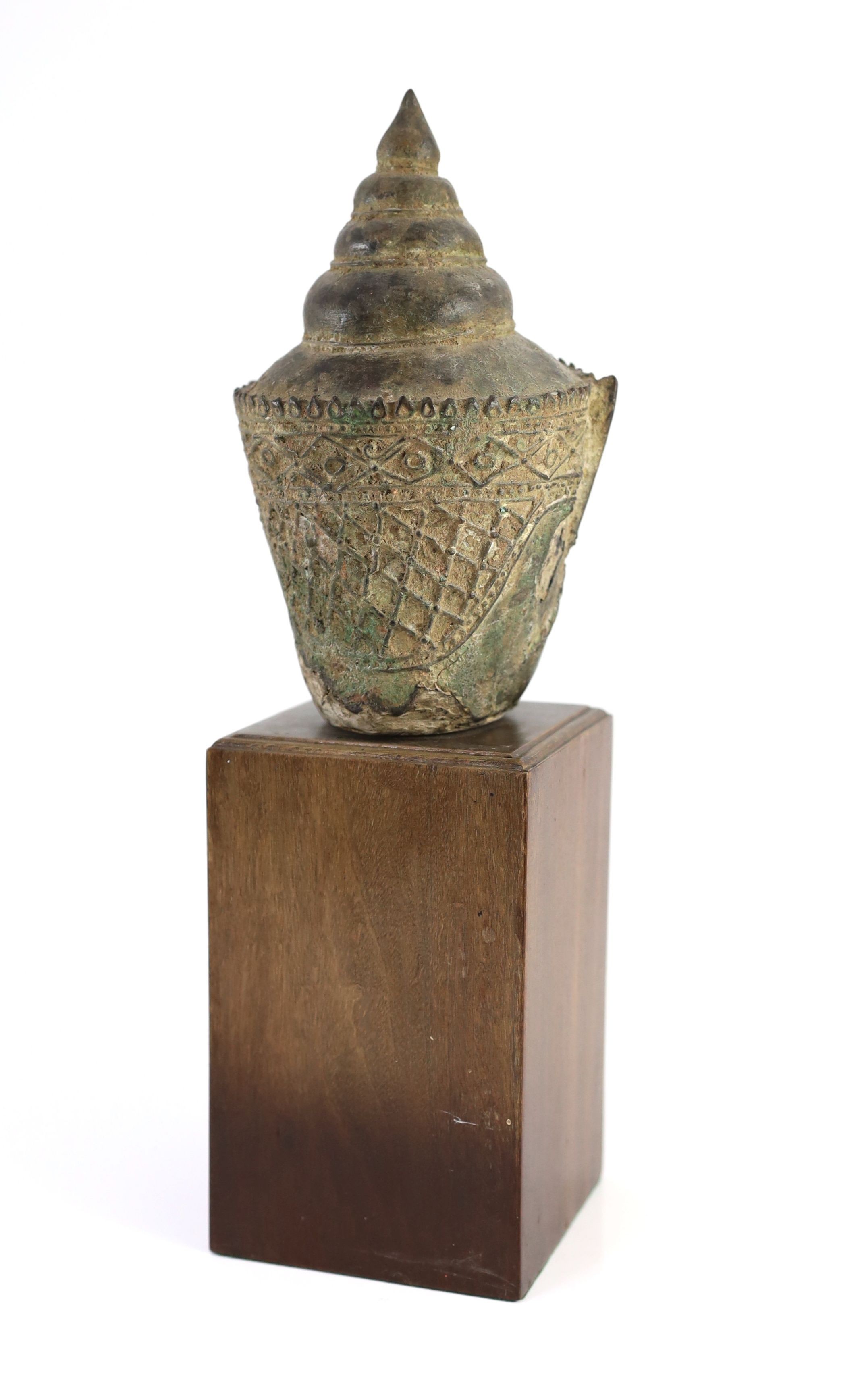 A Thai bronze crowned head of Buddha, 16th/17th century, 18cm high, excluding modern wood stand, ears lacking